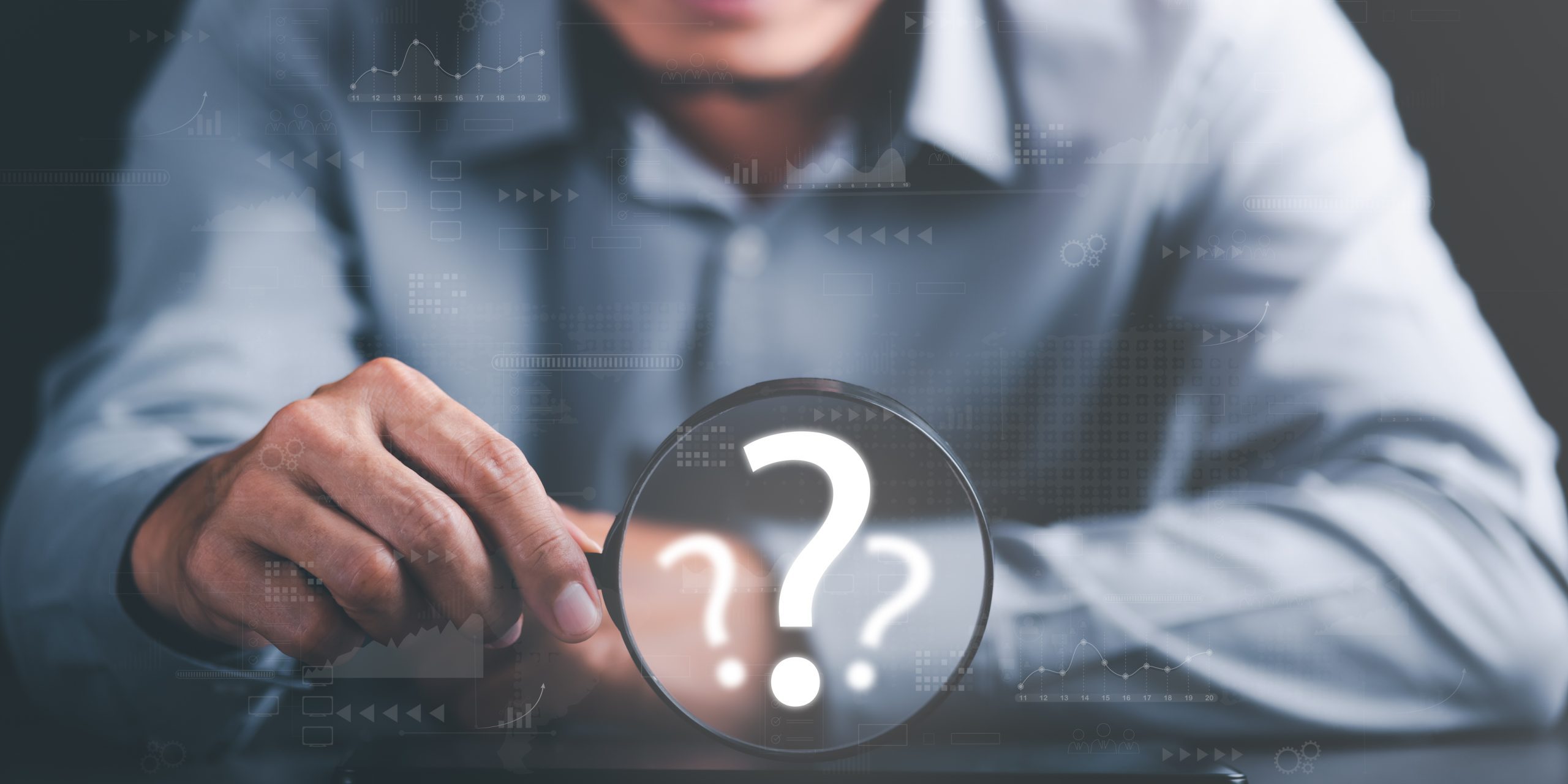 young man holding a magnifying glass Displays a search for information he is interested in through online websites,keyword search concept to find information from online websites,website link search